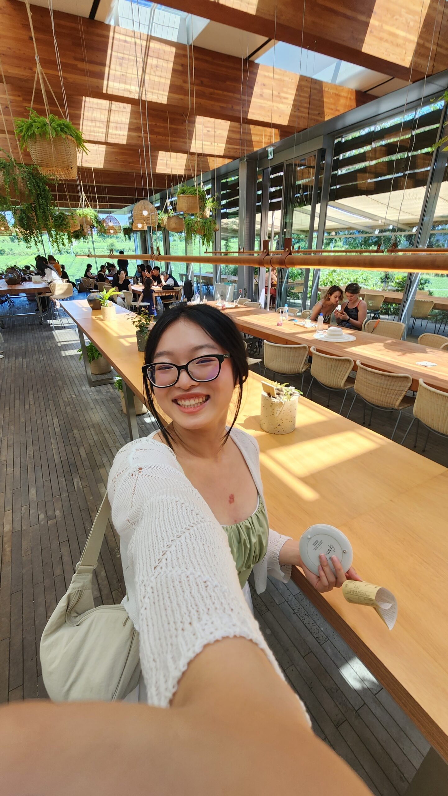 Things to do in Jeju, Osulloc Green Tea Field, Osulloc Green Tea Field cafe, girl smiling